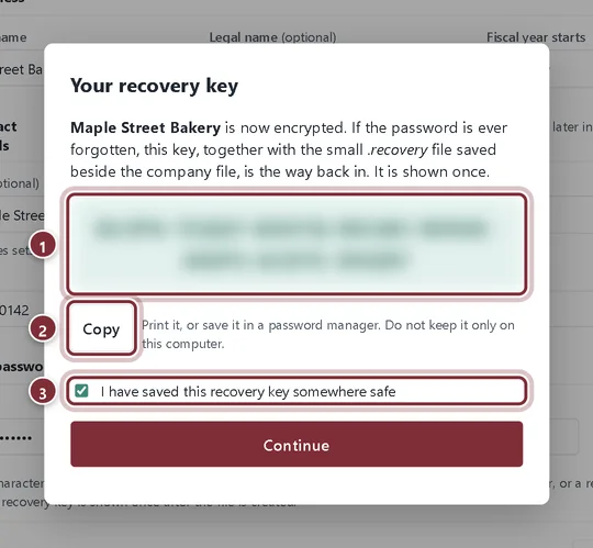 Your recovery key dialog with the key blurred, the Copy button and the confirmation checkbox